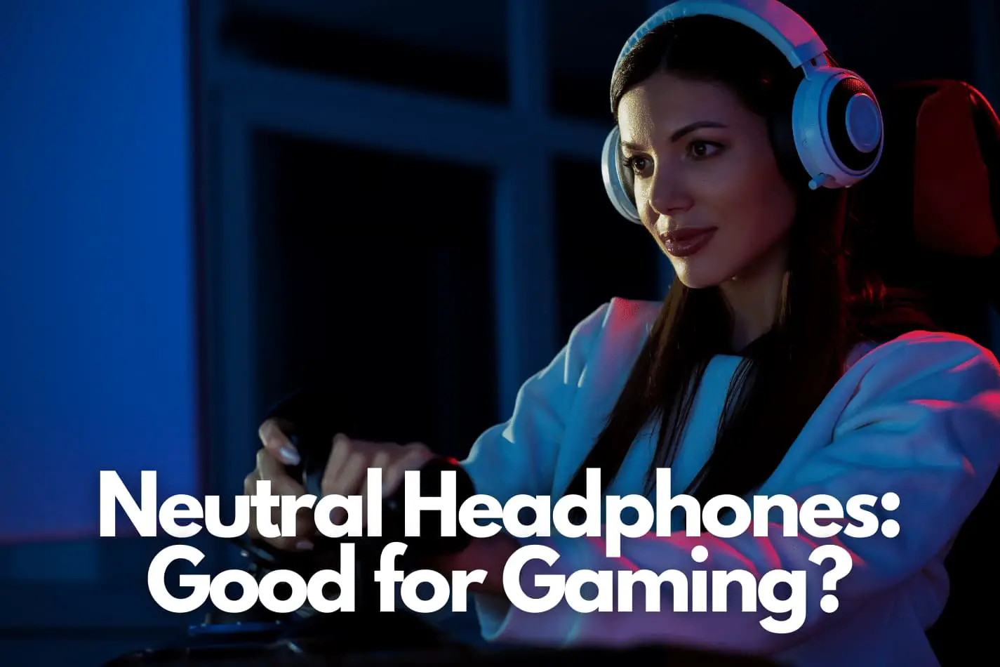 Woman gamer wearing headphones while playing games on her pc